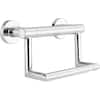 Chrome tissue holder with integrated grab bar mounted on bathroom wall.