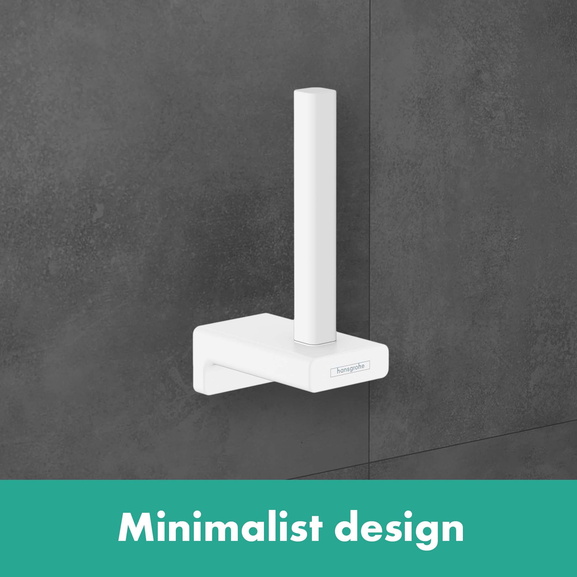 White toilet paper holder with vertical roll post mounted on gray tile wall.