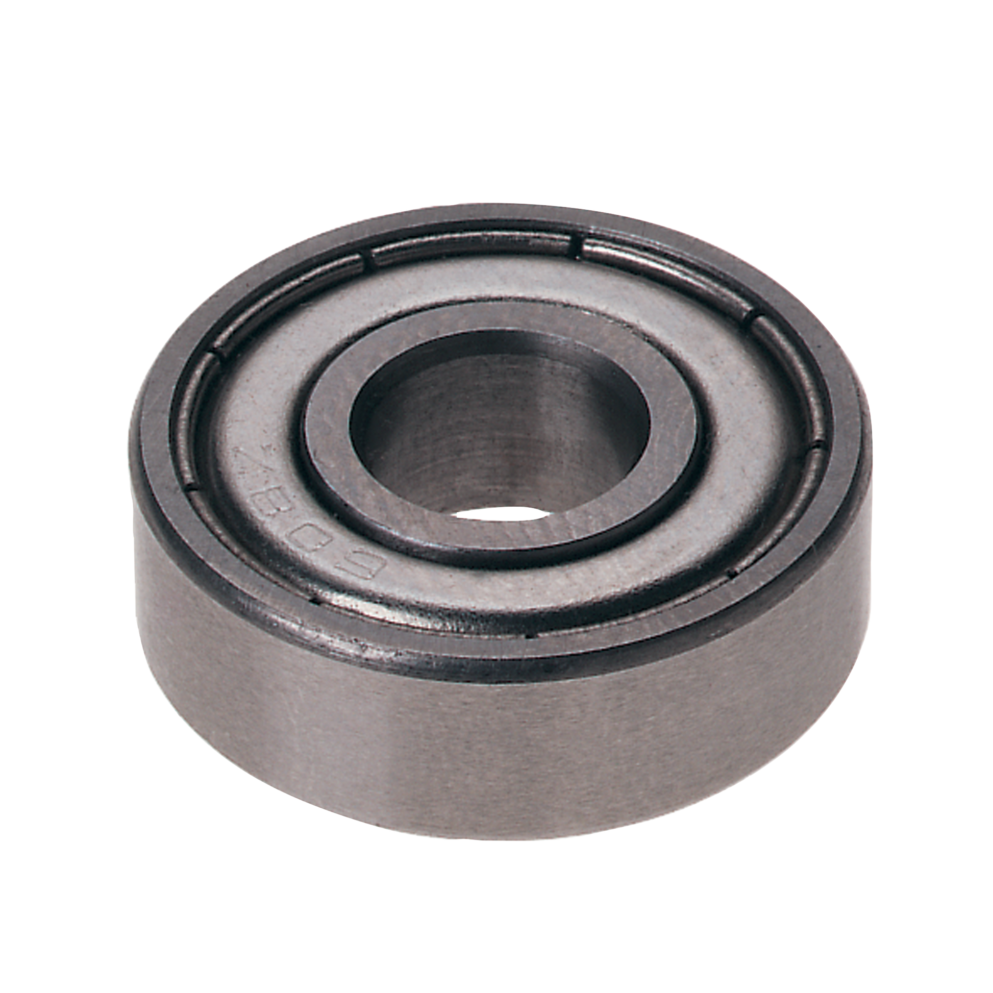 Metal ball bearing with concentric circular grooves and central shaft opening.