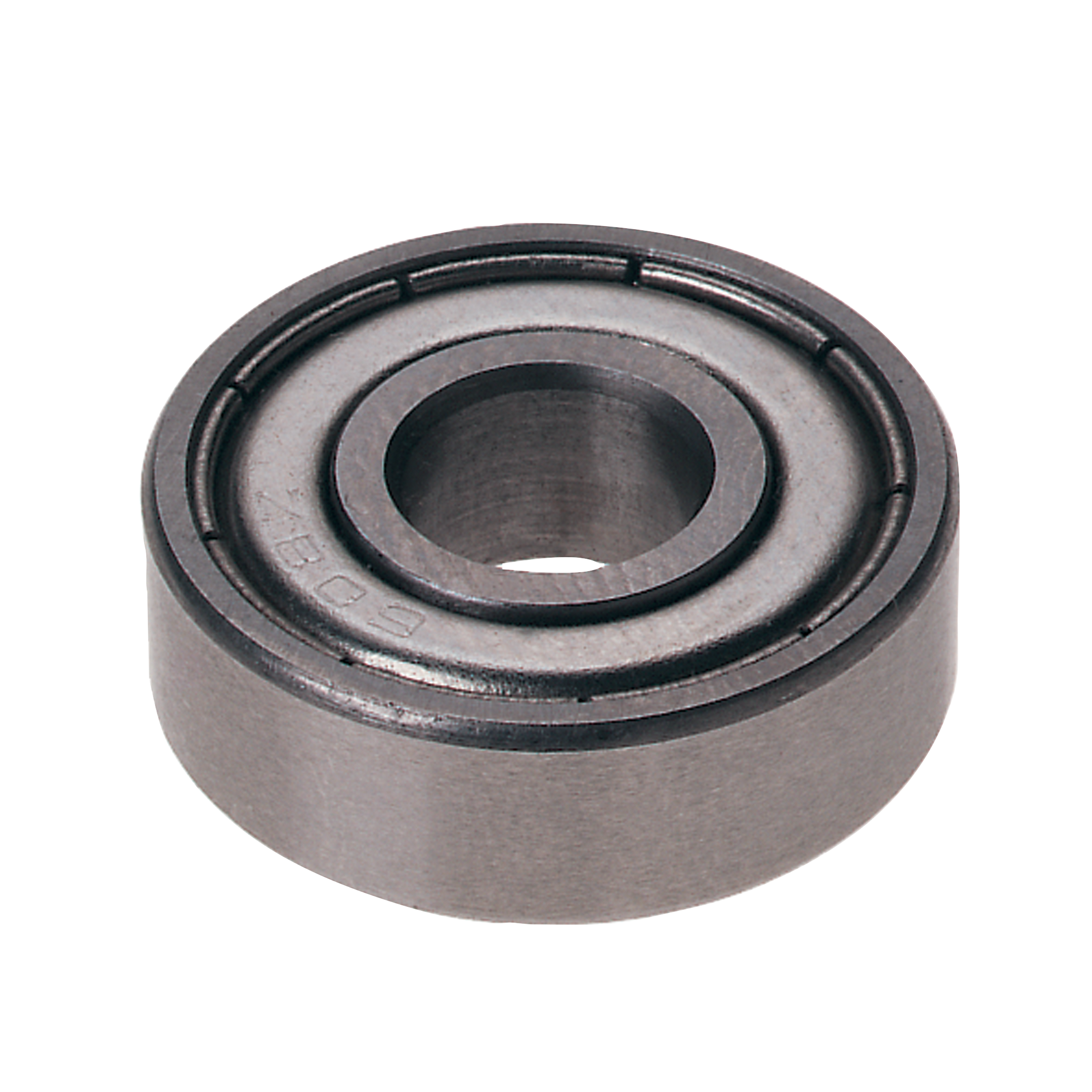 Metal ball bearing with concentric circular grooves and central shaft opening.