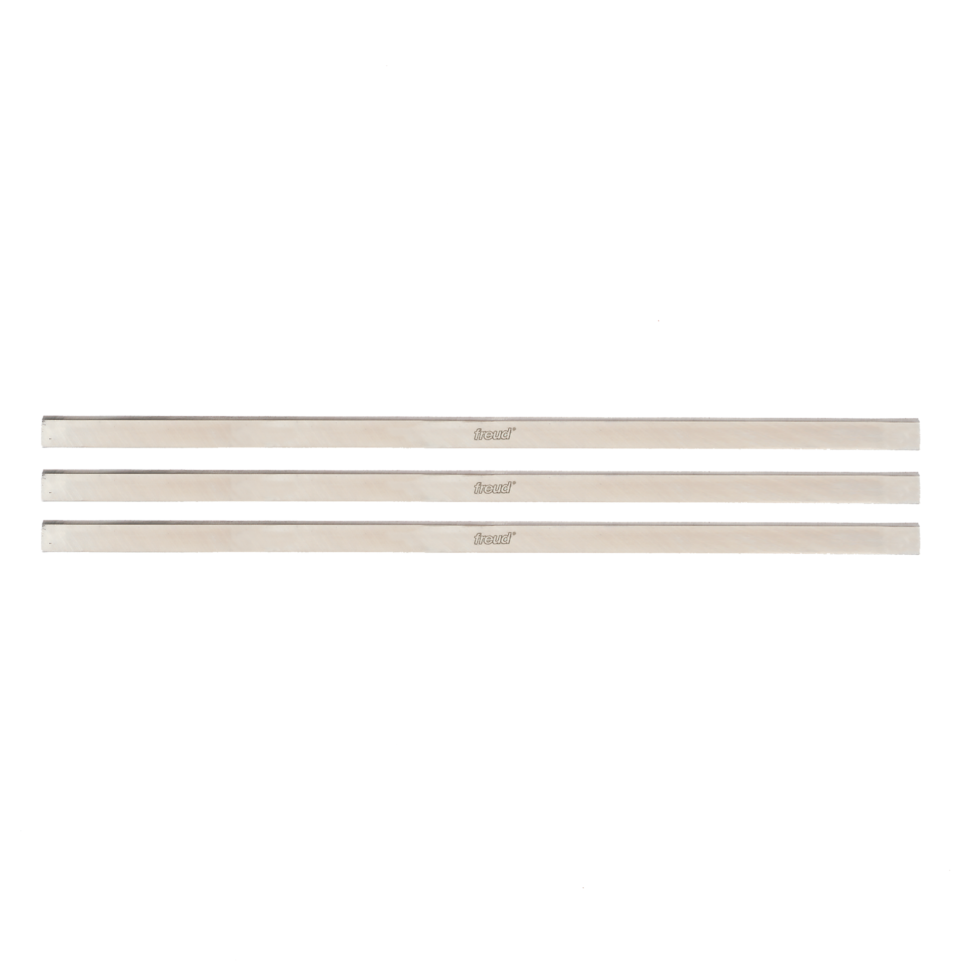 Three long, straight metal planer knives with "Freud" branding stamped on each blade.