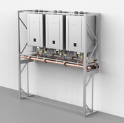 Three white tankless water heater units mounted on metal frame with copper piping connections.