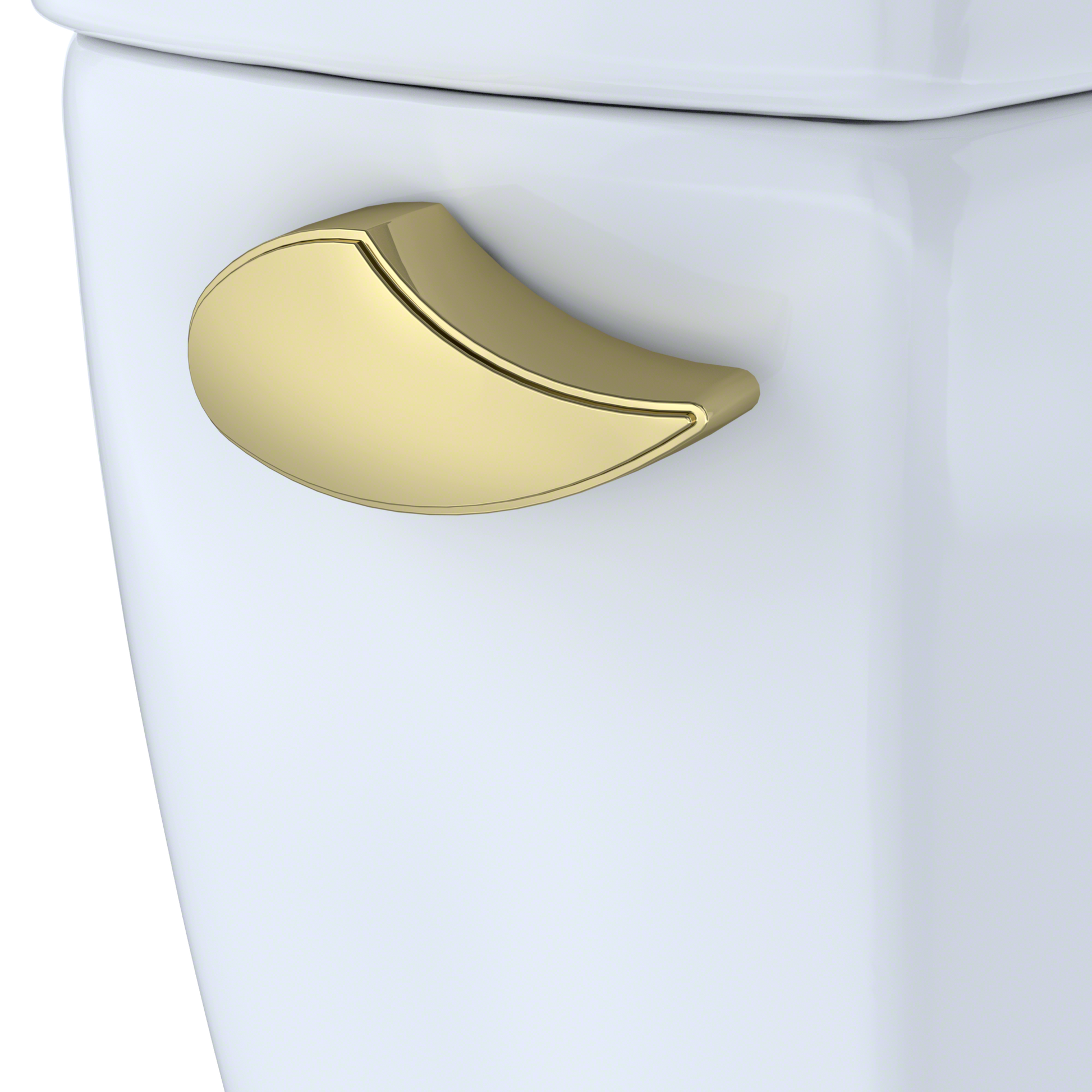 Polished brass trip lever with curved handle mounted on white toilet tank.
