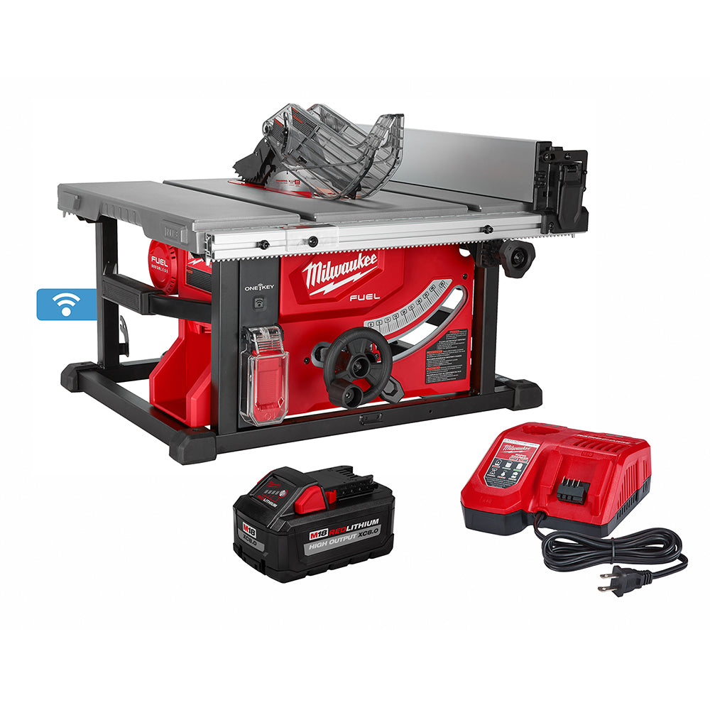 Milwaukee M18 FUEL table saw with blade guard, dust collection, ONE-KEY battery, and charger included.