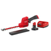 Red and black M12 FUEL hedge trimmer with battery, charger, and shoulder strap included.