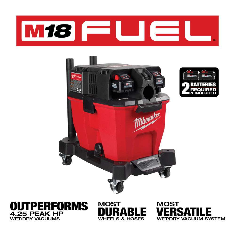 Red and black Milwaukee M18 FUEL wet/dry vacuum with dual battery slots and casters, shown with two included batteries.