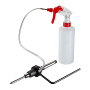 Black metal adapter with gray tubing connected to white spray bottle with red trigger and nozzle.