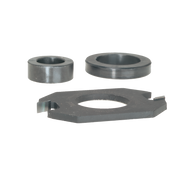 Three steel router bit components: two cylindrical spacers and one flat cutting ring with central hole.