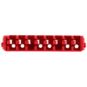Red plastic insert bit case row with multiple compartments and circular holes for organizing small accessories.