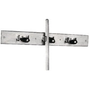 Wall-mounted mop hanger with three black hooks on a metal rail and vertical pole for storage.