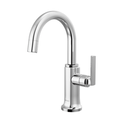 Chrome beverage faucet with curved arc spout and single lever handle on round base.