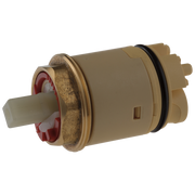 Cylindrical ceramic cartridge with brass fittings, red internal components, and black rubber seal ring.