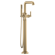 Brass floor-mount tub filler with curved spout, hand shower on hose, and single lever control.