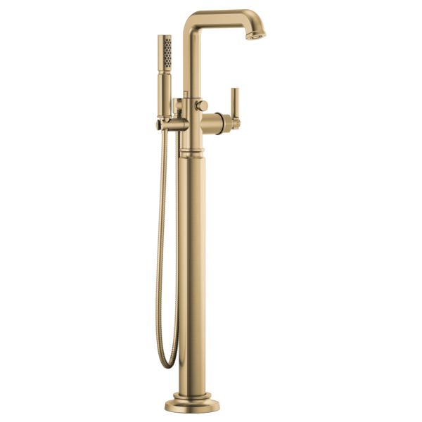 Brass floor-mount tub filler with curved spout, hand shower on hose, and single lever control.