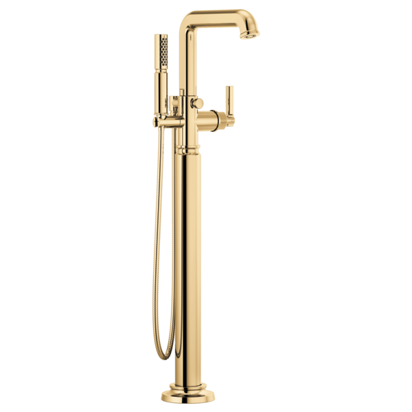 Brass single-handle floor-mount tub filler with curved spout, hand shower, and vertical control lever.