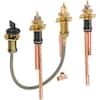 Two-handle brass faucet assembly with flexible hoses and handheld shower head attachment.