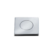Square brushed bronze air switch push button with oval depression on face and dark base.