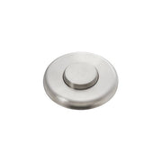 Satin nickel circular air switch push button with domed center and flat surround.