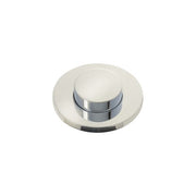 Polished nickel air switch push button with tuxedo-style chrome band accent on round base.