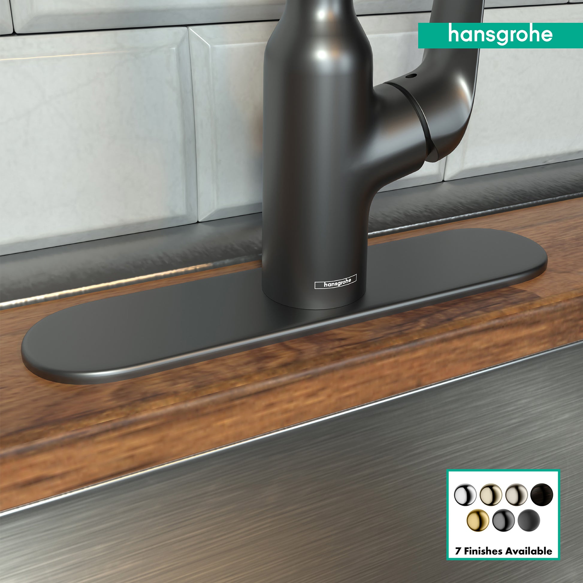 Brushed black chrome oval base plate for kitchen faucet installed under faucet spout on wooden countertop.