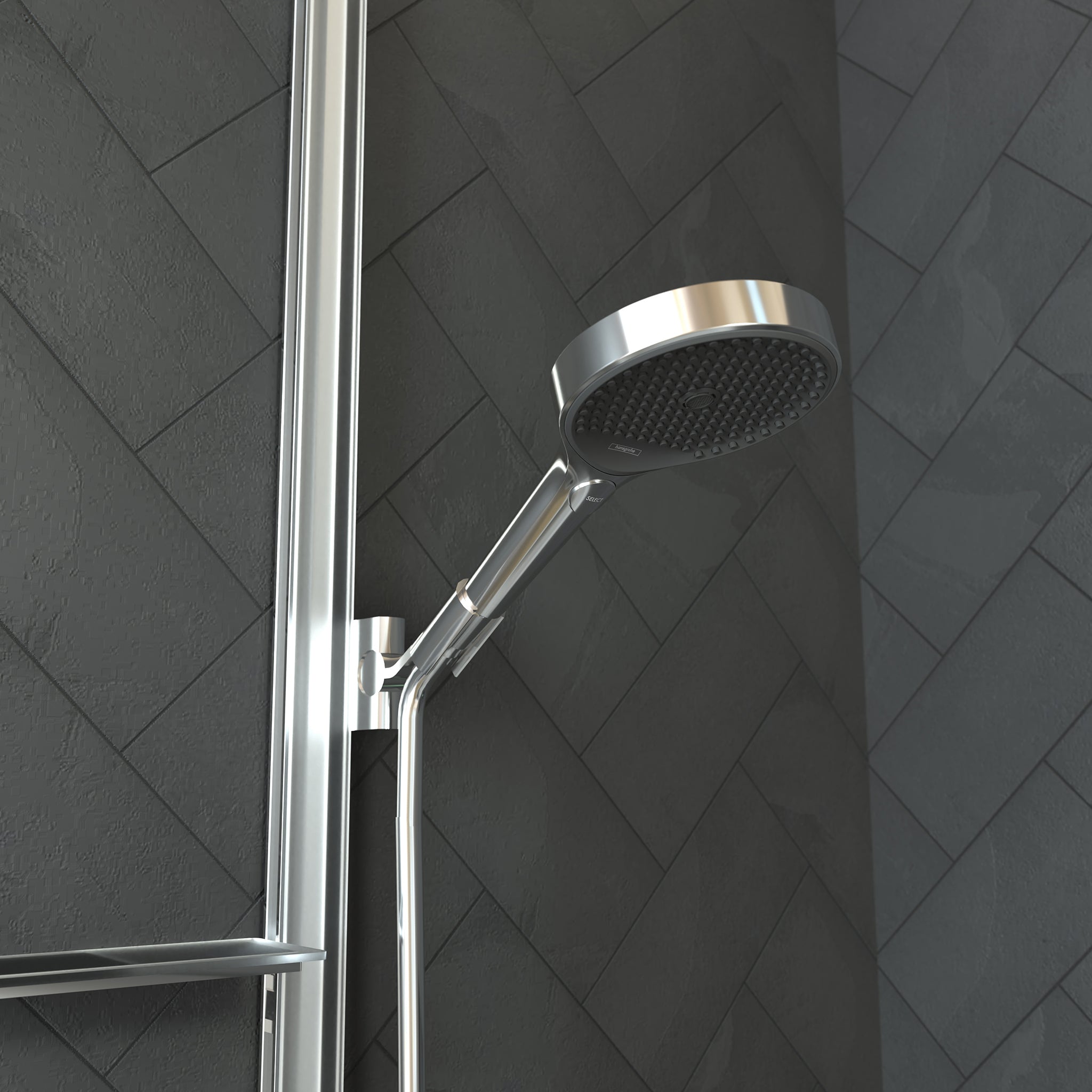 Chrome handheld showerhead with perforated face mounted on vertical rail against herringbone tile wall.