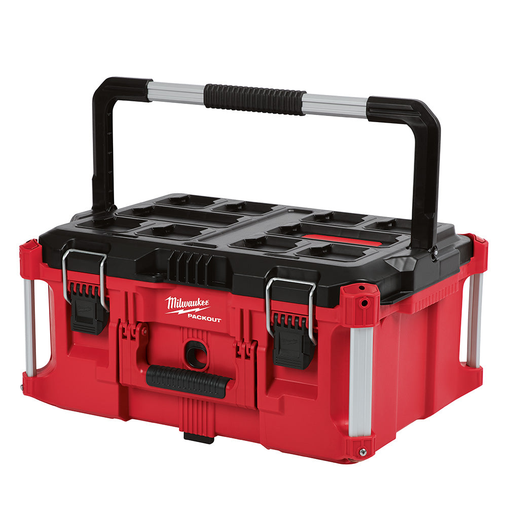 Red and black Milwaukee PACKOUT tool box with metal handle and removable compartment trays.