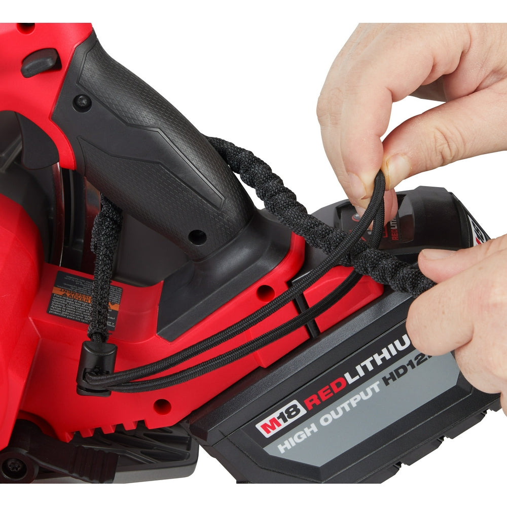 Black nylon lanyard with locking mechanism attached to red Milwaukee tool, shown being held by hand.