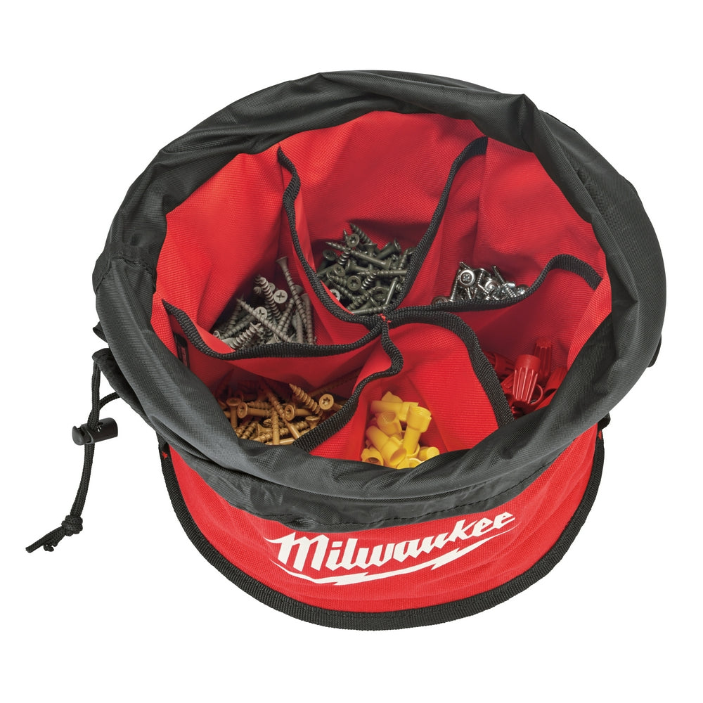 Red and black drawstring organizer bag with multiple interior pockets holding various fasteners and small tools.
