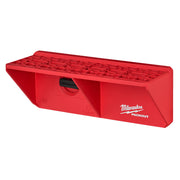 Red Milwaukee PACKOUT screwdriver rack with multiple slots across top surface and black handle cutout on front face.