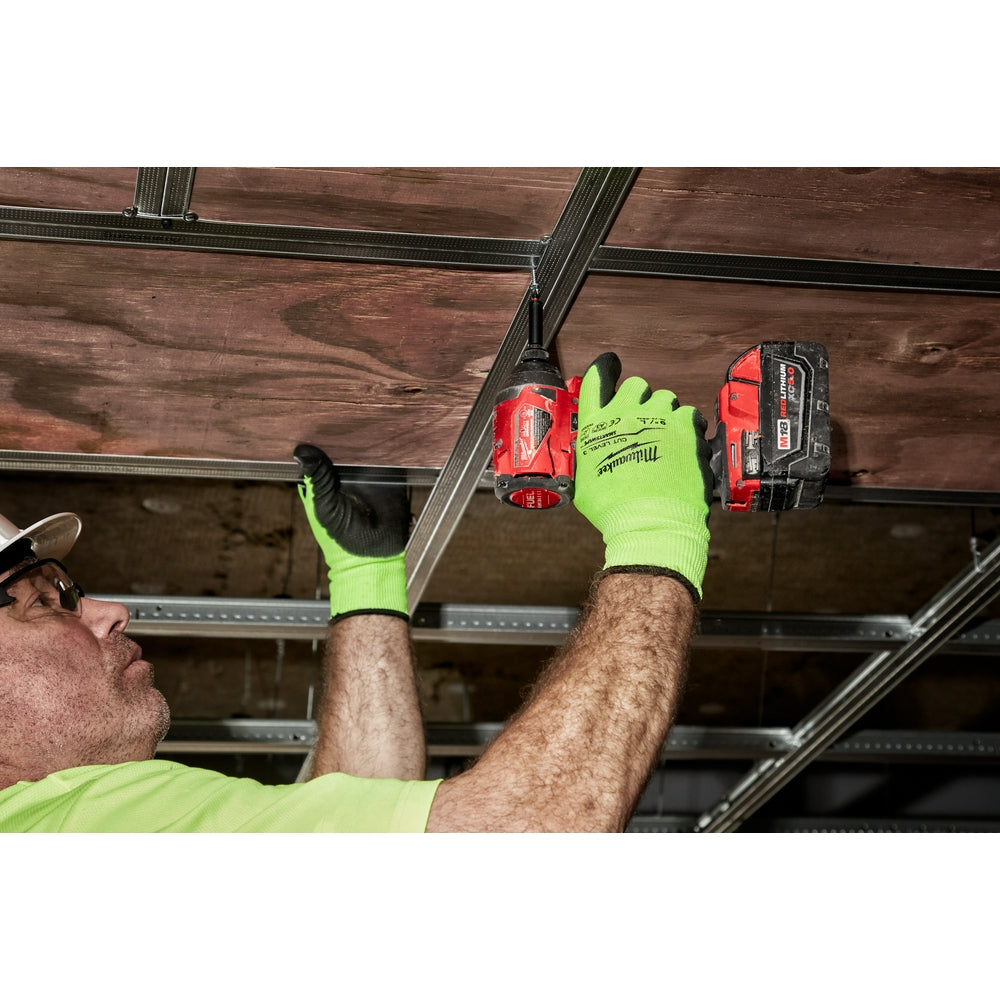 High-visibility yellow-green and black polyurethane dipped work gloves worn while handling tools overhead.