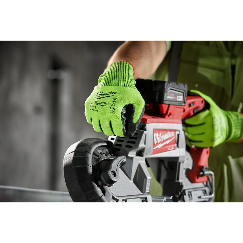 Bright yellow-green work glove with black polyurethane palm coating being worn while holding a power tool.