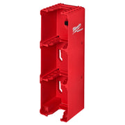 Red Milwaukee PACKOUT battery rack with four horizontal slots for storing M18 batteries vertically.