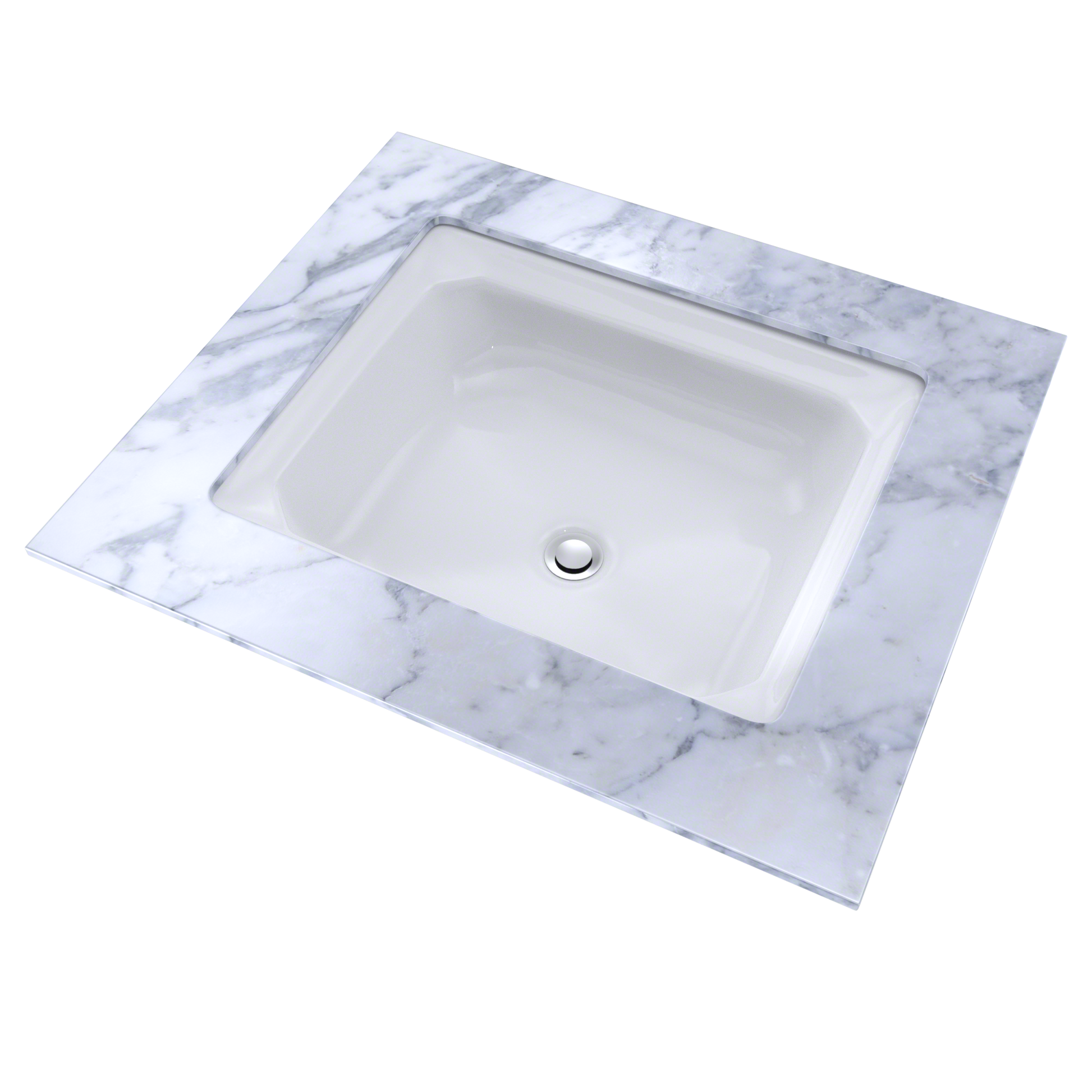 White rectangular undermount sink with chrome drain fitting set in marble-patterned countertop surface.