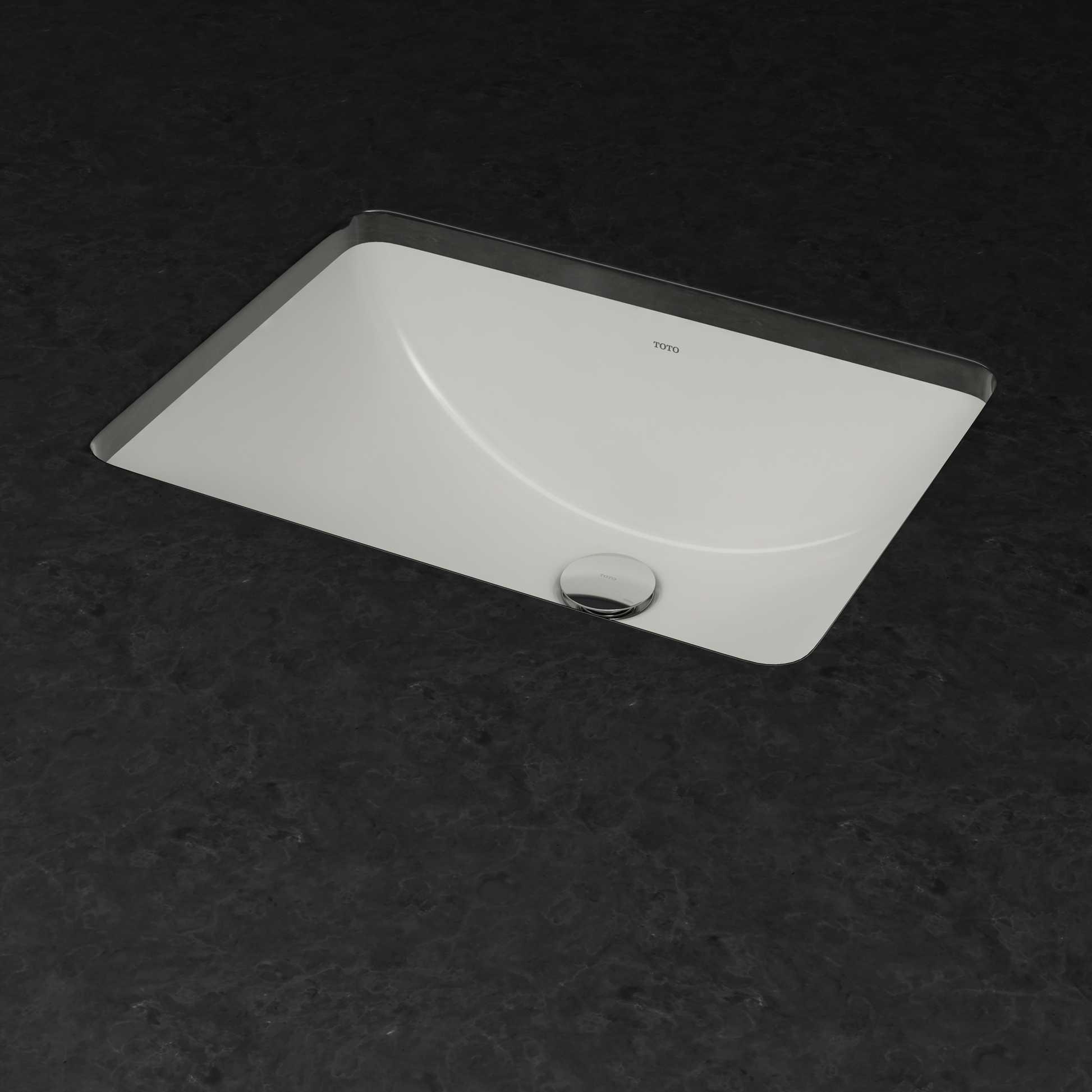 Cotton white rectangular undermount sink with curved basin and single drain opening.