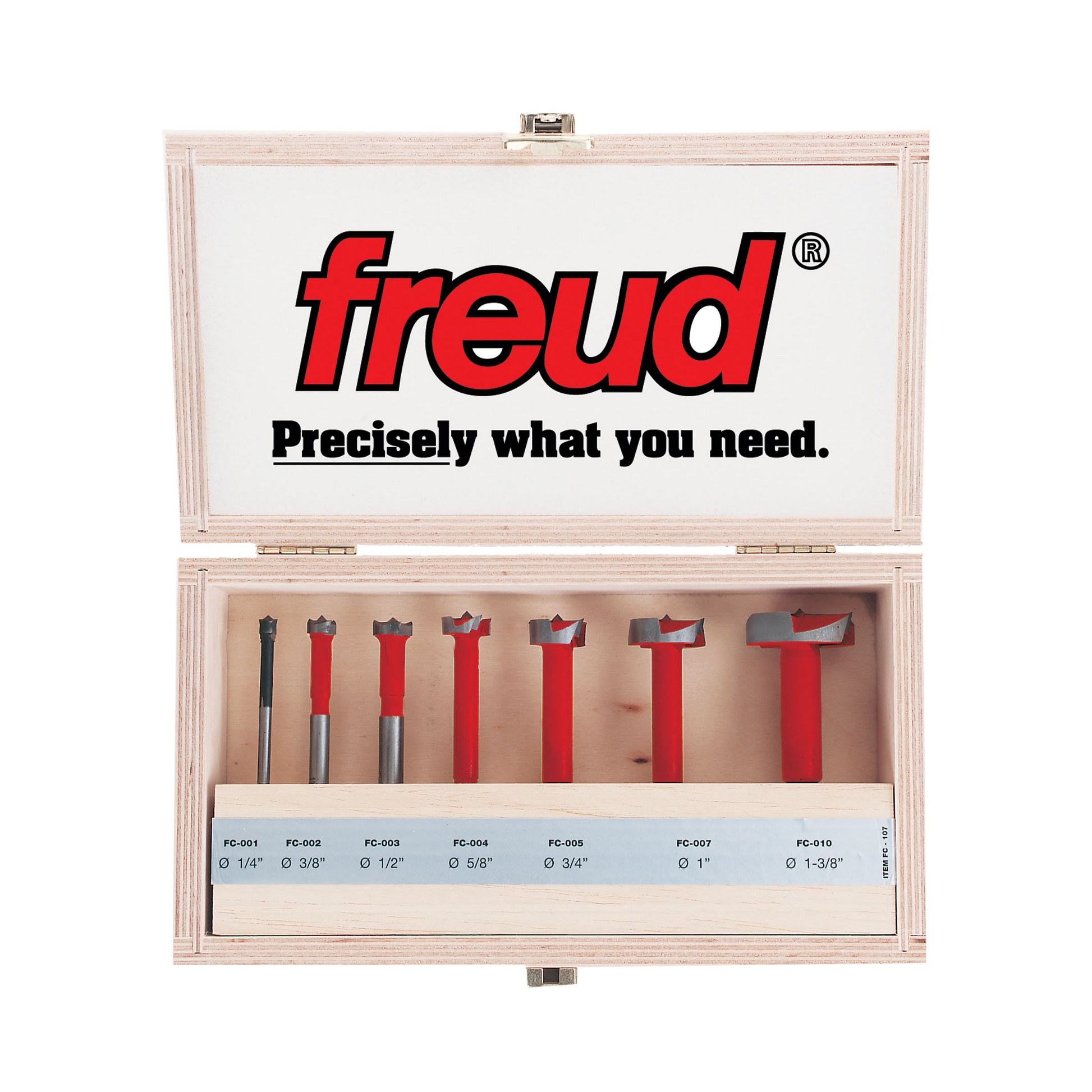 Seven Freud Forstner bits with red handles and gray cutting heads in wooden storage case with labeled compartments.