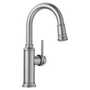 Stainless steel pull-down kitchen faucet with curved spout and single handle control.