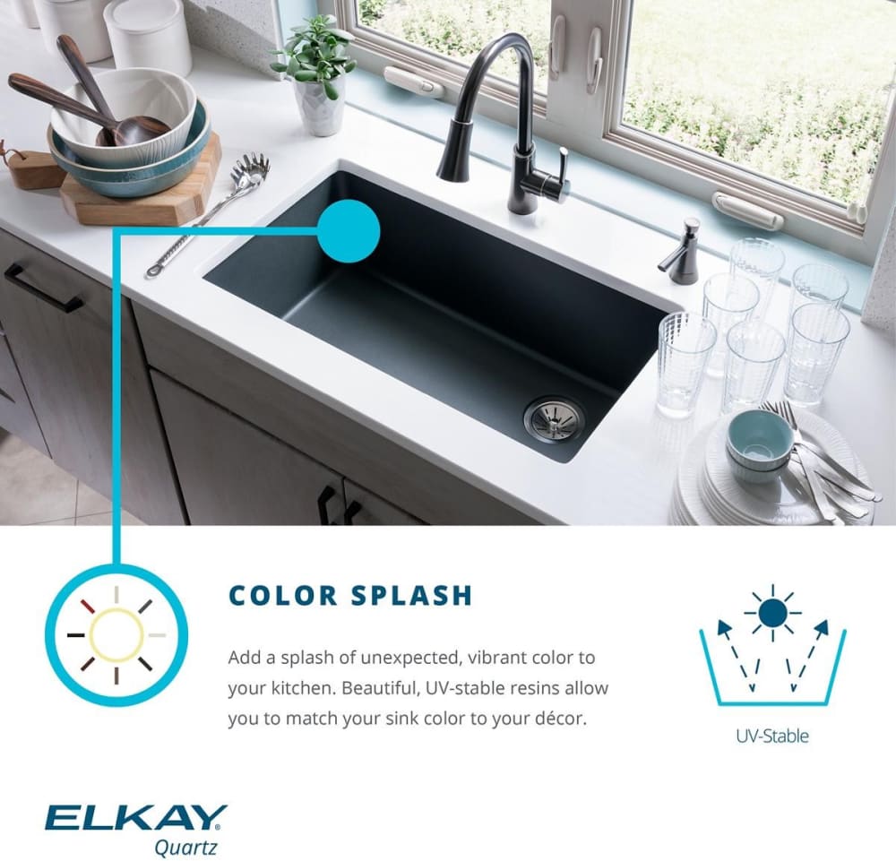 Bisque quartz undermount double bowl sink installed in white countertop with black faucet.