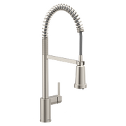 Stainless steel kitchen faucet with coiled spray hose and single lever handle.