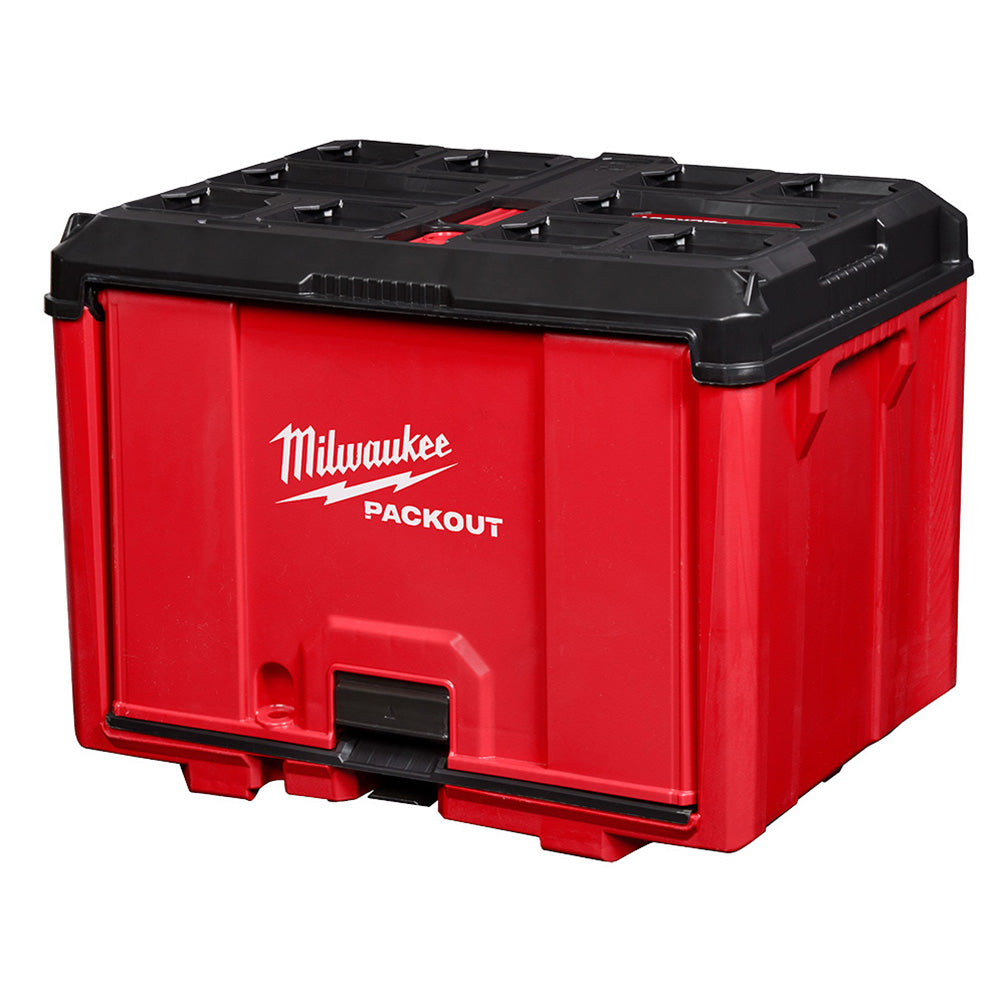 Red and black Milwaukee PACKOUT storage cabinet with hinged top lid and front pull-out drawer.