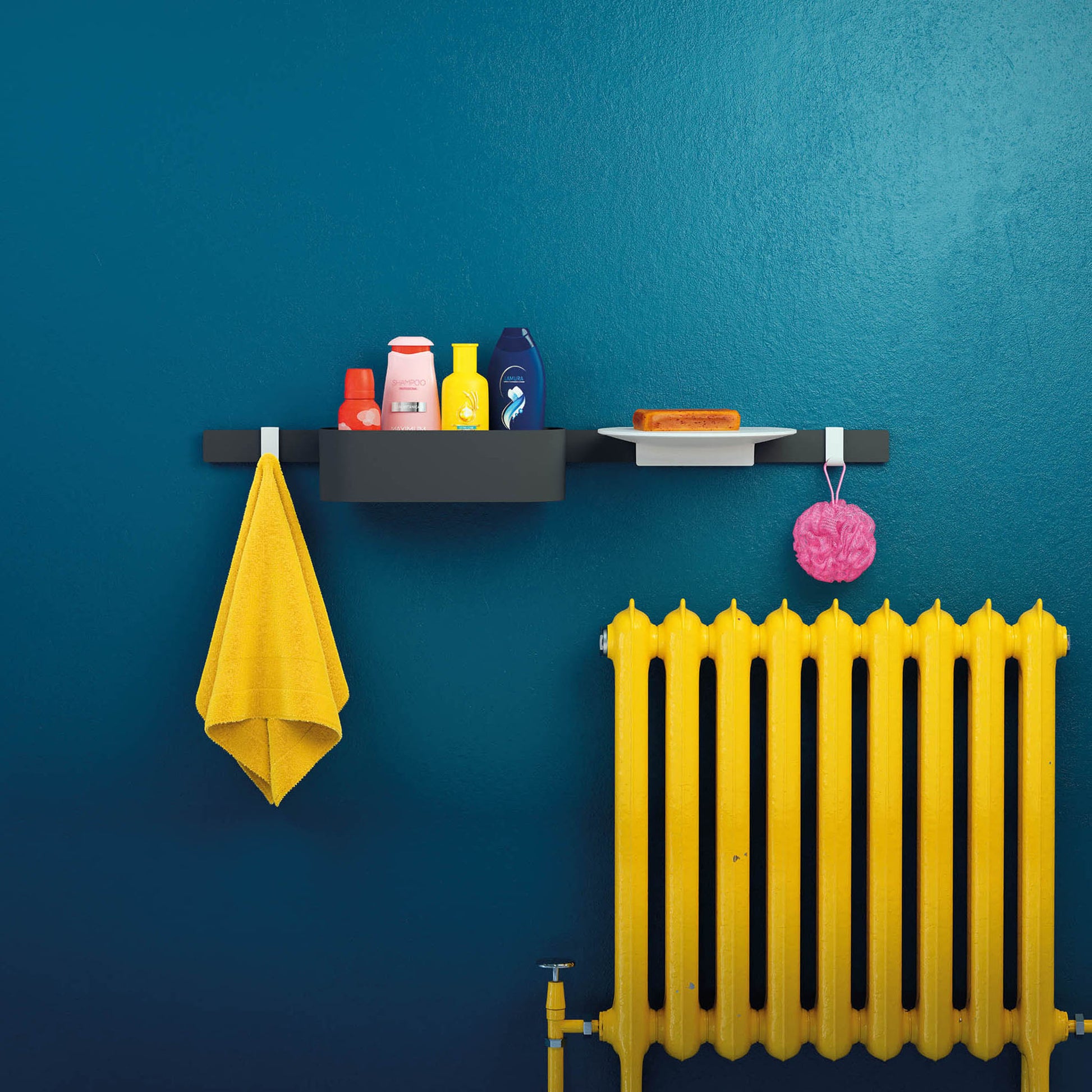 Matte white wide towel hook mounted on wall with yellow towel hanging from left side and pink bath accessory from right side.