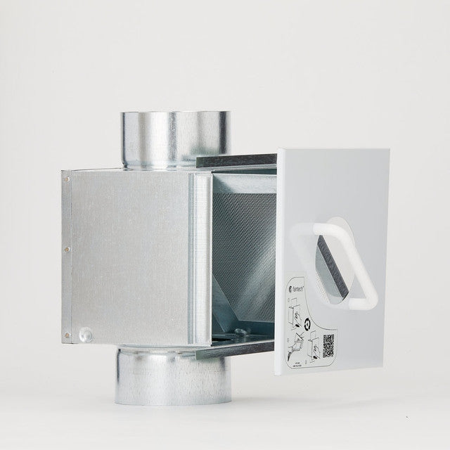 Four-inch lint trap and power ventilator unit with aluminum ducting and white control box with cord attachment.