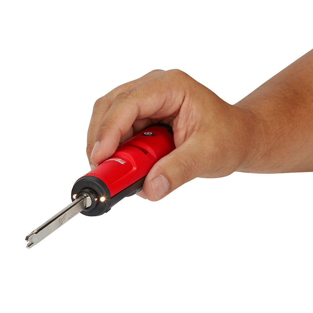 Red and black punchdown tool with extended metal blade held in hand.