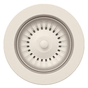 Soft white metal waste flange with circular rim and radial slot vents around central post.