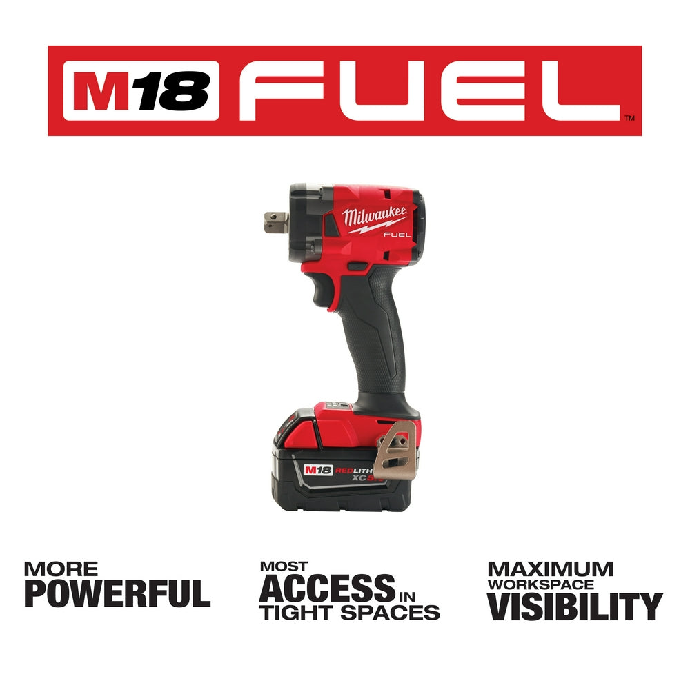 Milwaukee M18 FUEL compact impact wrench with red and black body, pin detent head, and battery pack attached.
