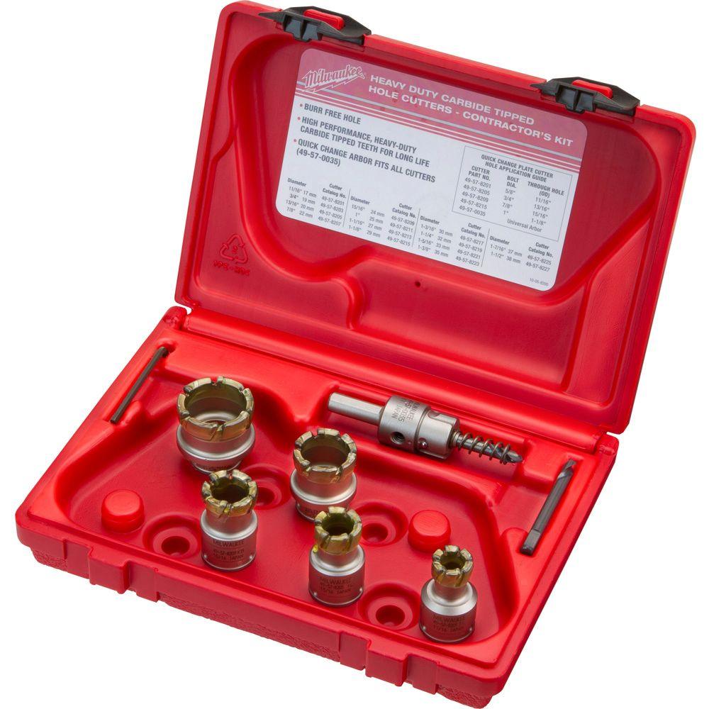Seven carbide-tipped hole cutters of varying sizes with arbor and accessories in red Milwaukee carrying case.