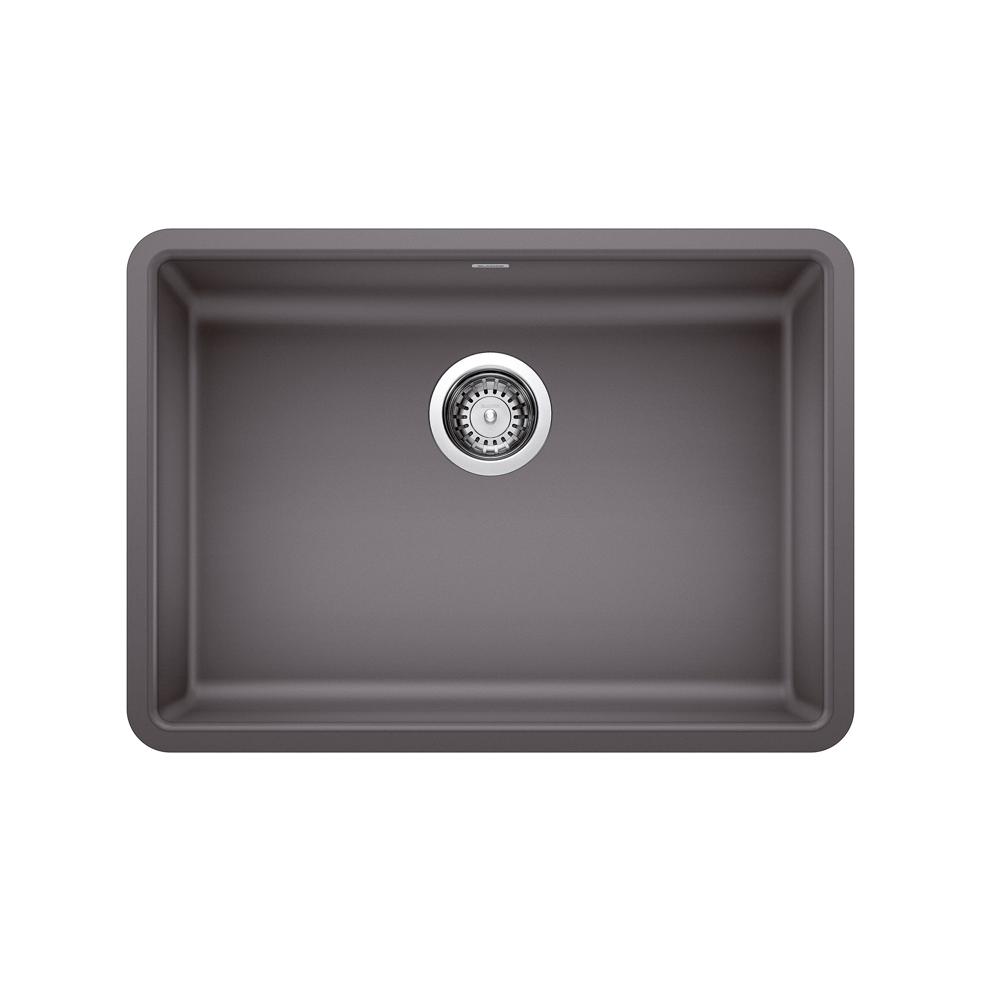 Dark gray undermount kitchen sink with single basin and chrome drain strainer viewed from above.