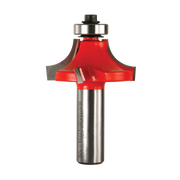 Router bit with red cutting head, silver metal shaft, and bearing guide at top for woodworking edge rounding.