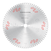 Circular saw blade with multiple teeth around perimeter, central arbor hole, red wavy markings, and "Freud" branding on silve