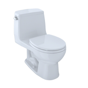 White one-piece round toilet with closed soft-close seat and tank, shown from angle view.