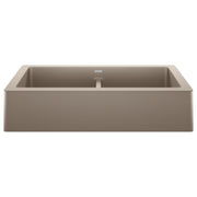 Truffle-colored double apron farmhouse sink with two equal basins separated by a center divider.